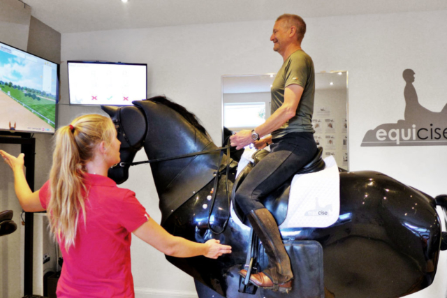 A lesson on the horse riding simulator