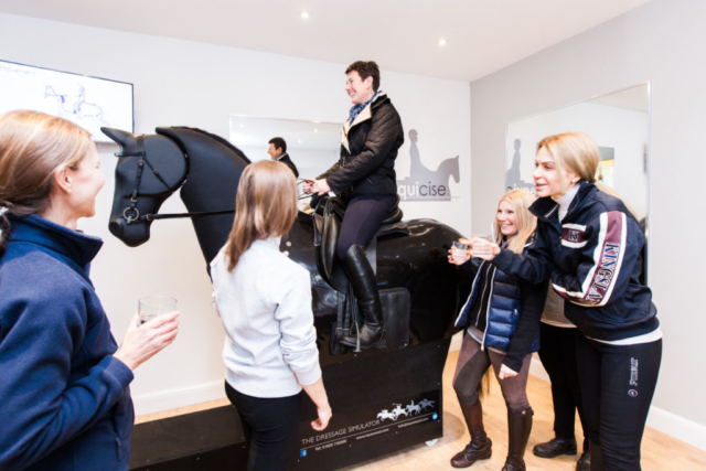 A class lesson on the Equicise horse simulator